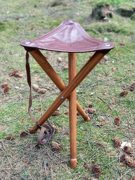 Three-legged stool made of solid ash wood and cowhide 